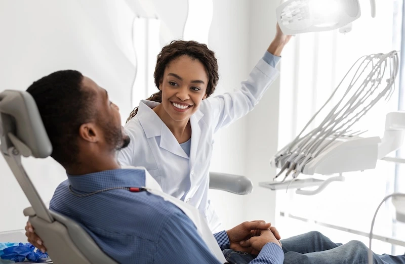Dentist smiling at patient